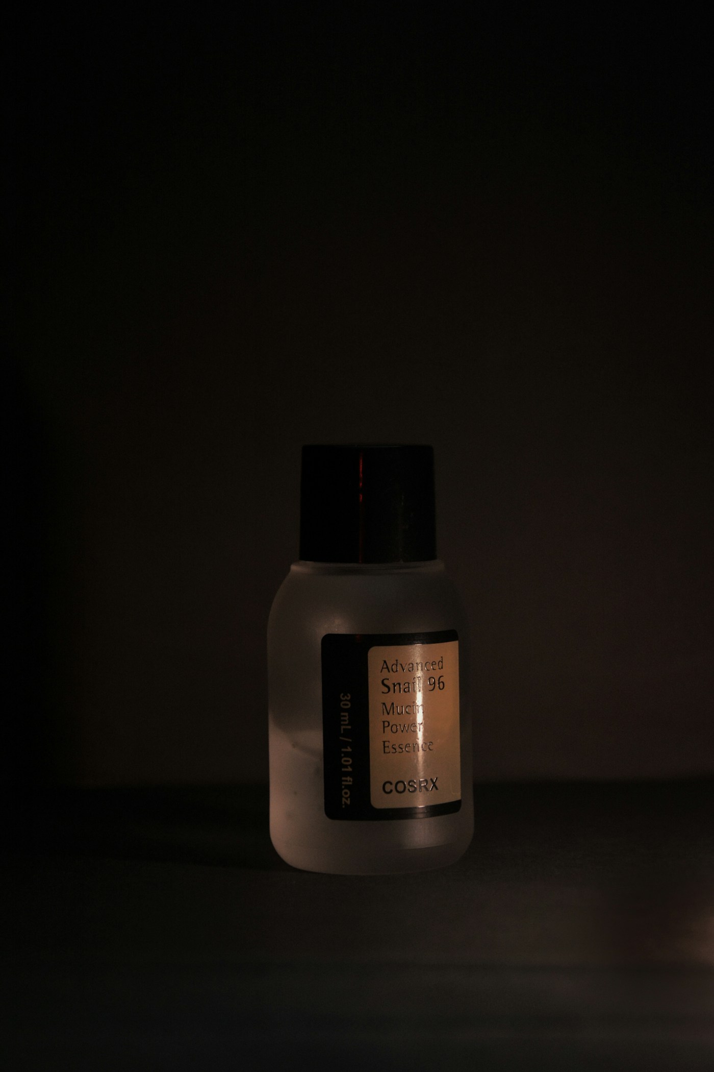 COSRX Advanced Snail 96 Mucin Power Essence travel bottle with a visible 30ml label